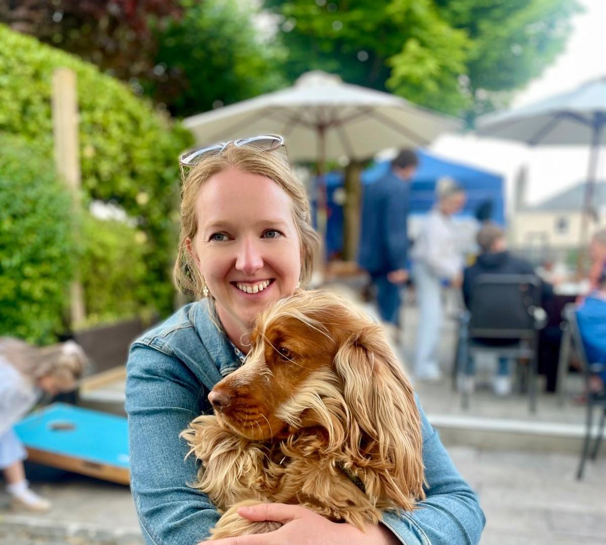 The owner of Camel Valley Canines with her dog